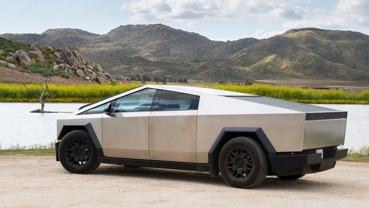 The 2025 Tesla Cybertruck seen from a rear quarter angle