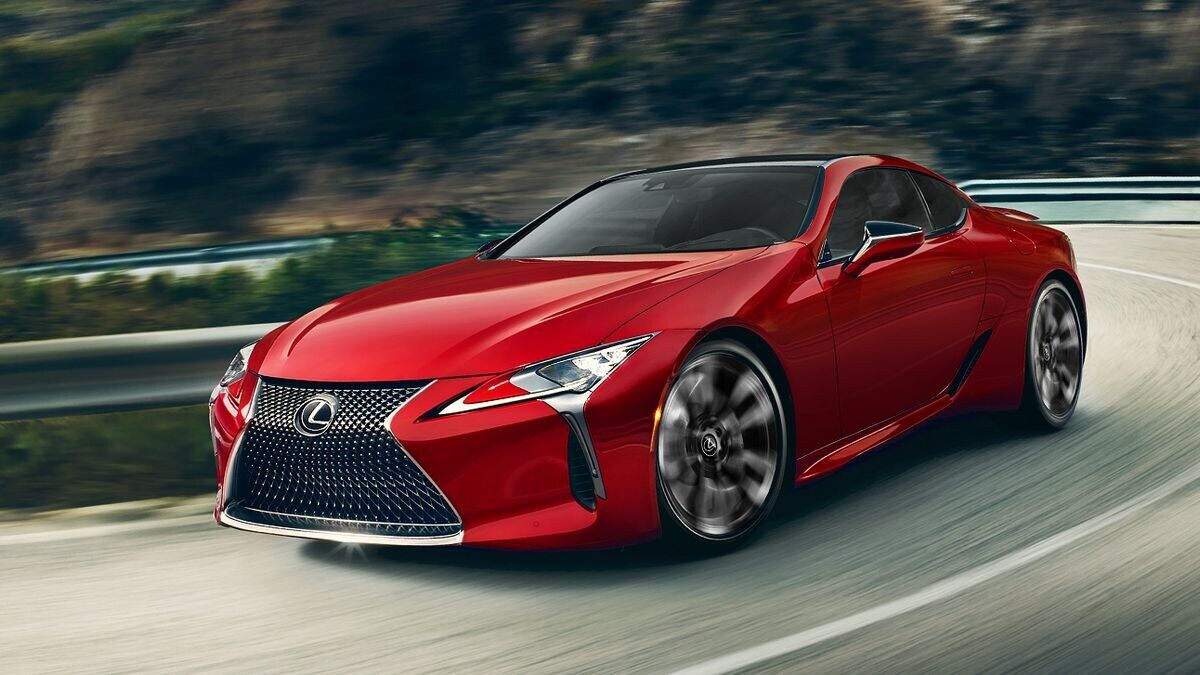 2025 Lexus LC driving around a curve.