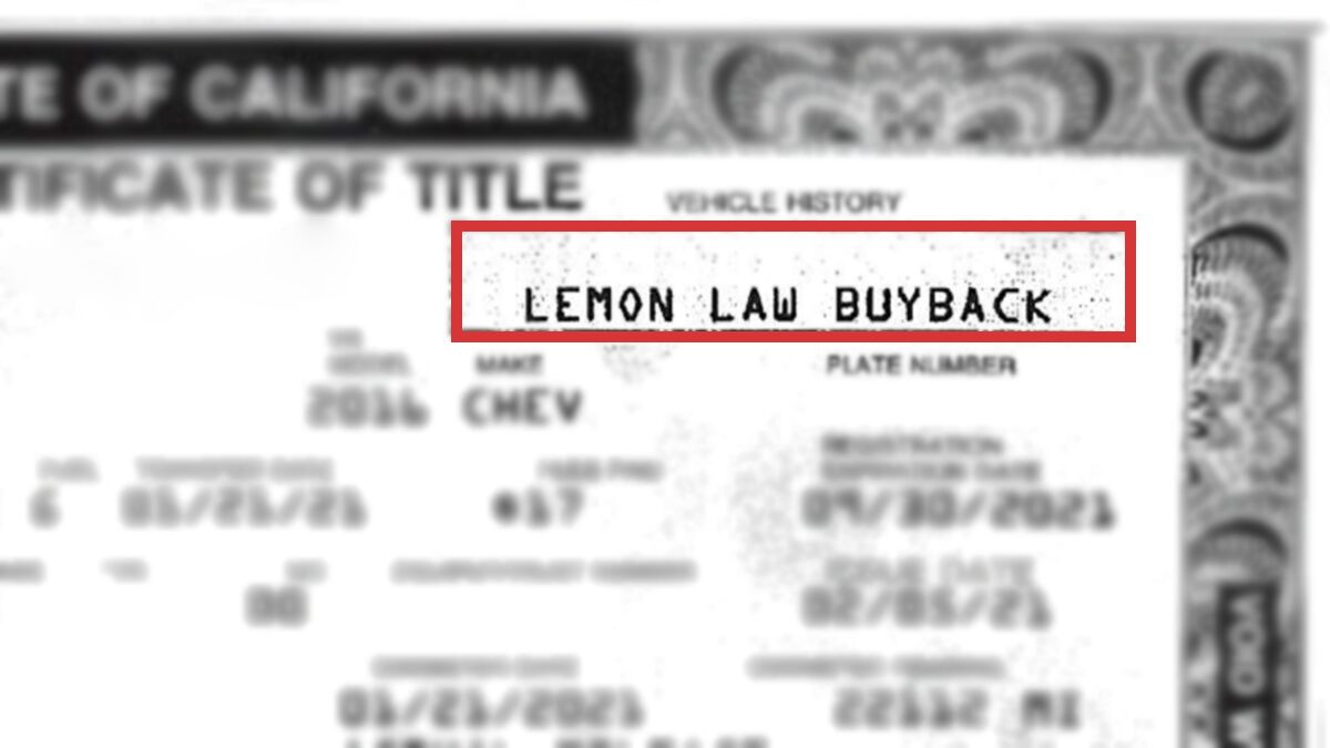 Blurred image of a California Car title certificate with the "Lemon Law Buyback" part highlighted in red