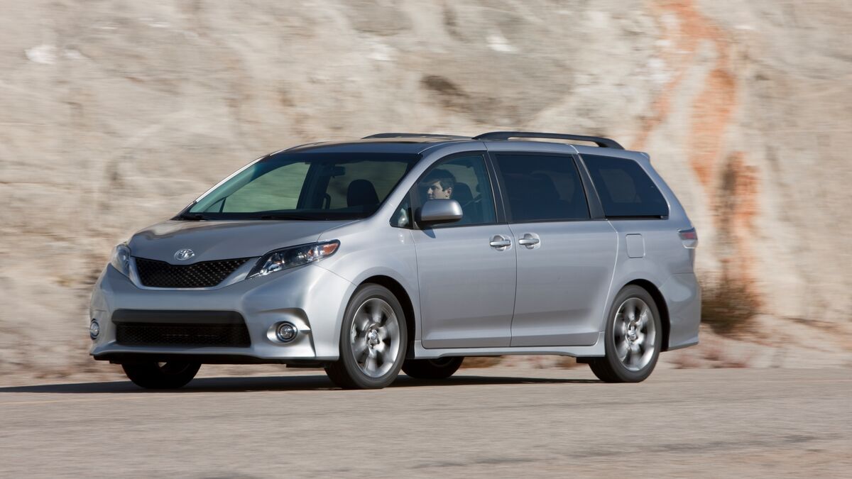The 2012 Toyota Sienna in gray seen from a front quarter angle