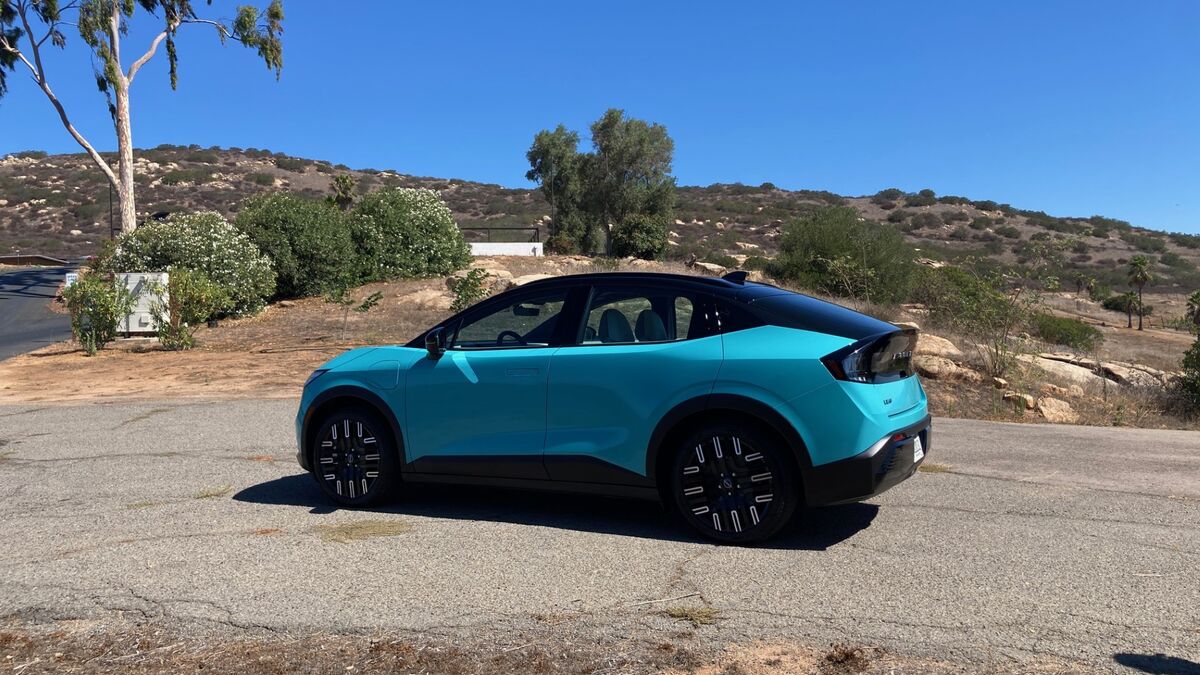 2026 Nissan Leaf SV+ side profile in Seabreeze Blue Pearl