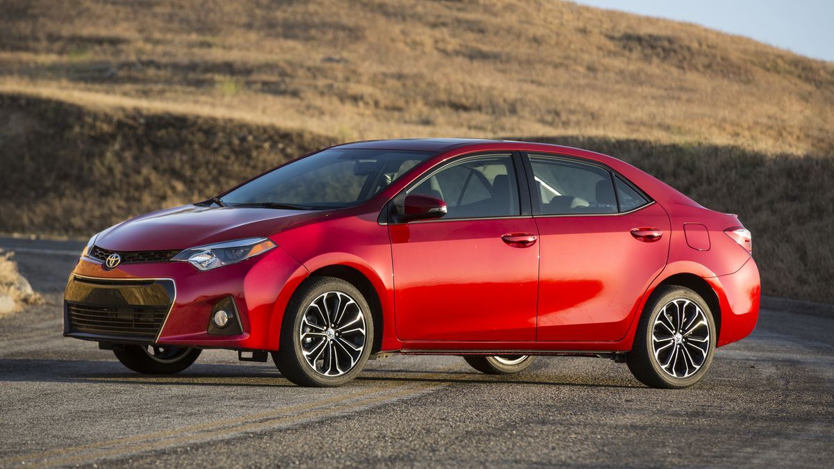 2015 Toyota Corolla with hills in the background.