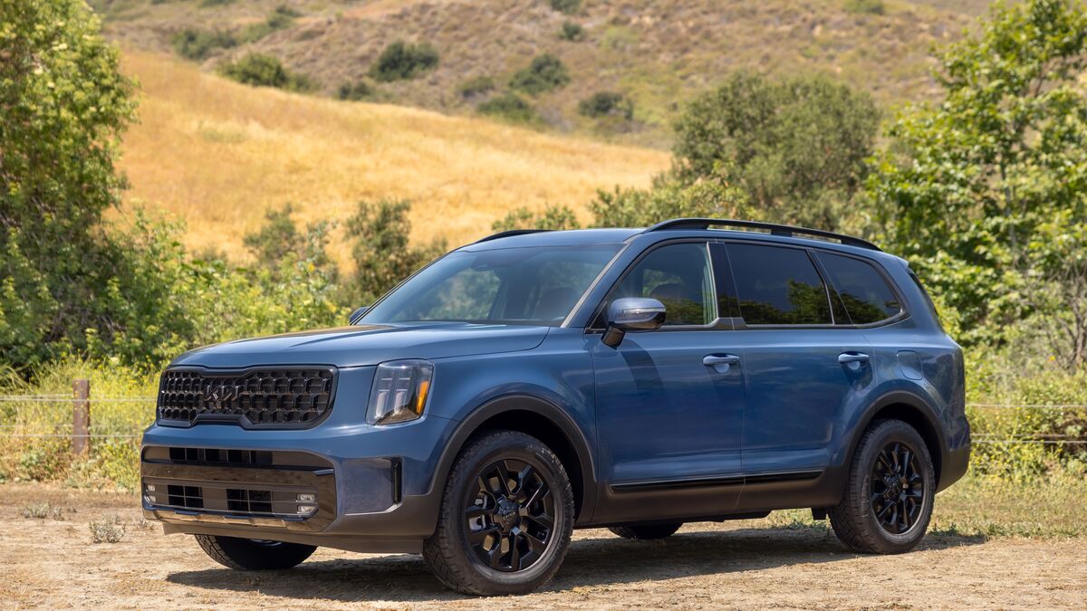 2026 Kia Telluride parked outside by some trees.