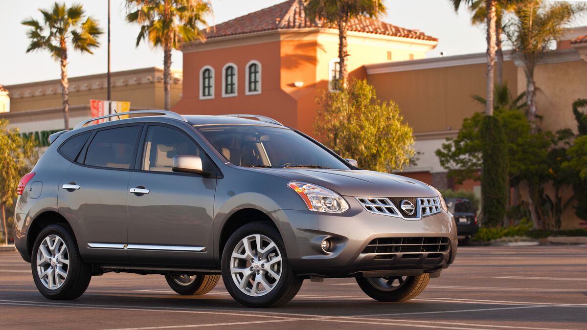 2011 Nissan Rogue on the road.
