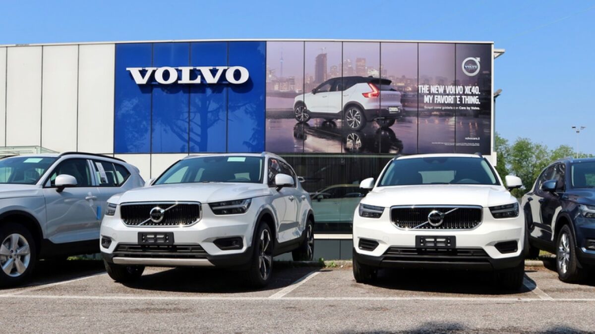 Cars lined up for sale at a Volvo dealership