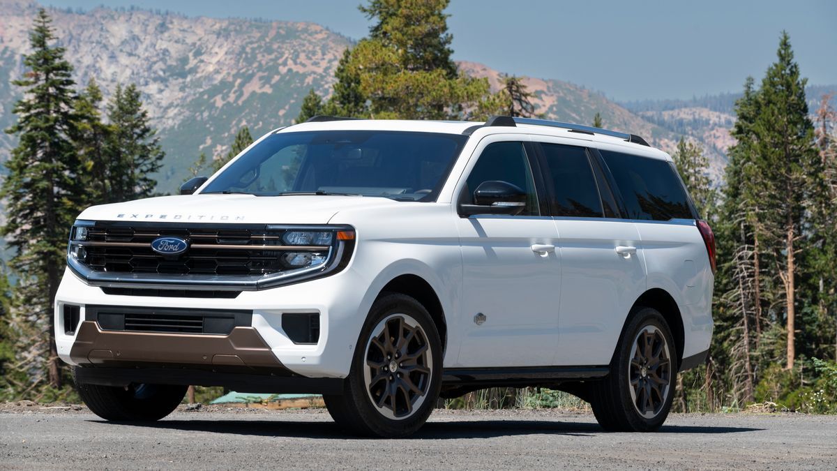 2025 Ford Expedition King Ranch with pine trees in the background.