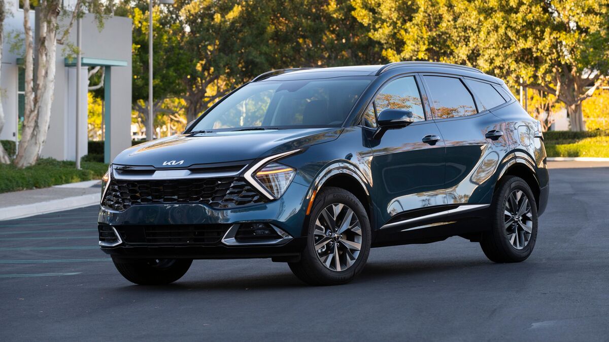 2025 Kia Sportage Hybrid parked in and around Irvine office parking lot.