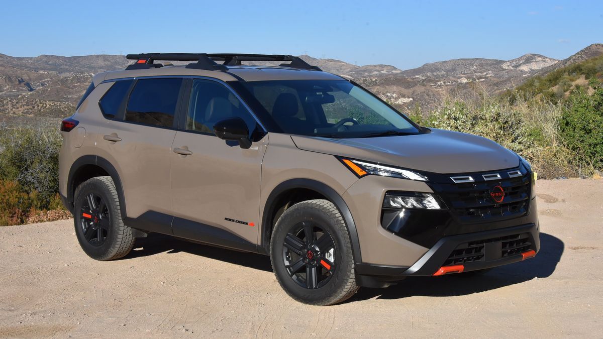 2025 Nissan Rogue Rock Creek with hills in the background.