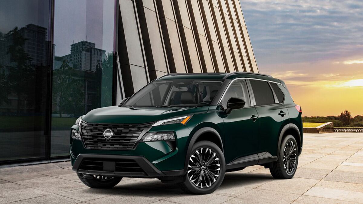 2026 Nissan Rogue parked by a building.