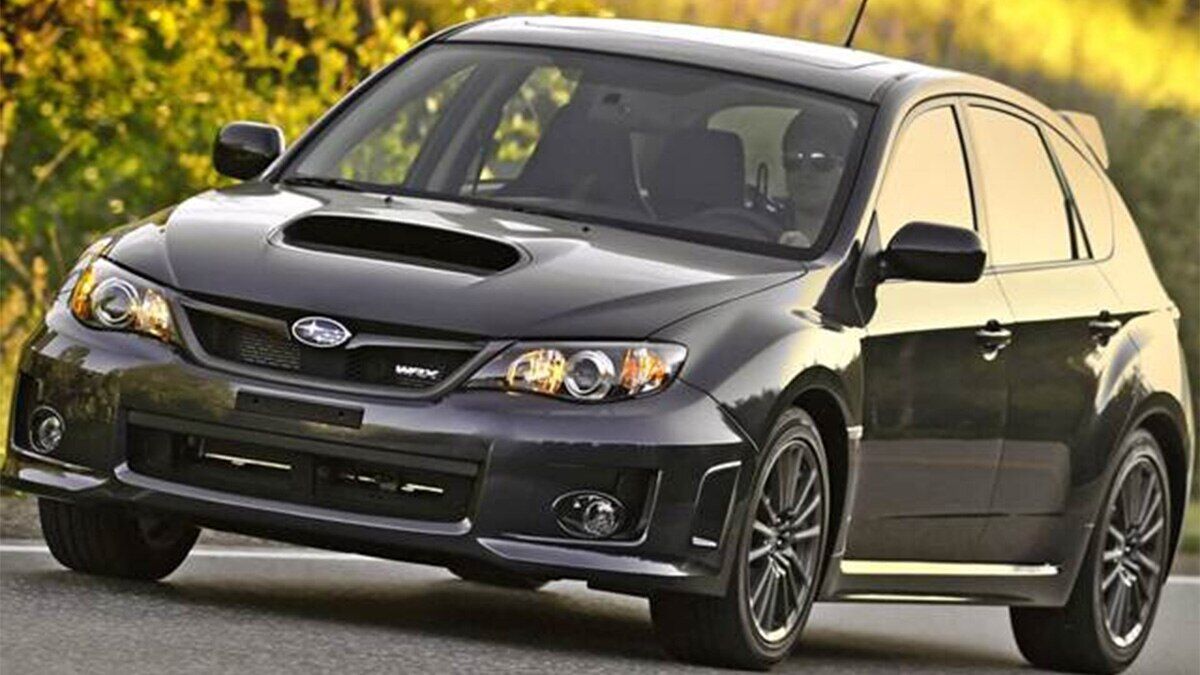 2014 Subaru Impreza WRX on the road.