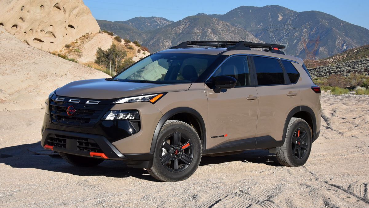 2025 Nissan Rogue Rock Creek with hills in the background.