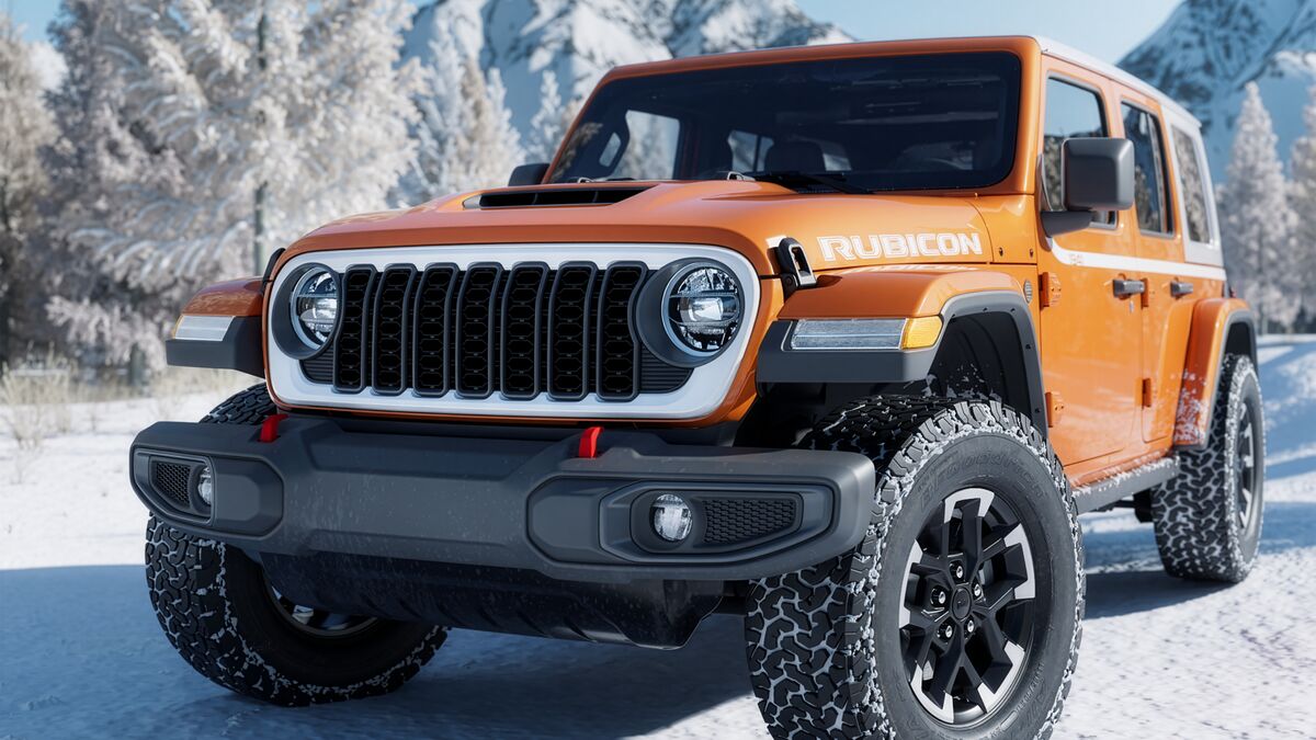 The 2026 Jeep Wrangler Whitecap Rubicon in orange seen from a front quarter angle