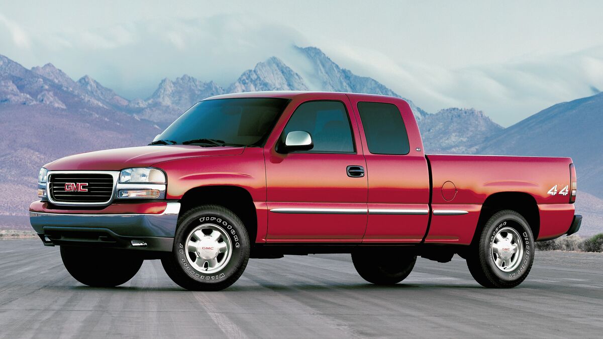 1999 GMC Sierra parked on the road.