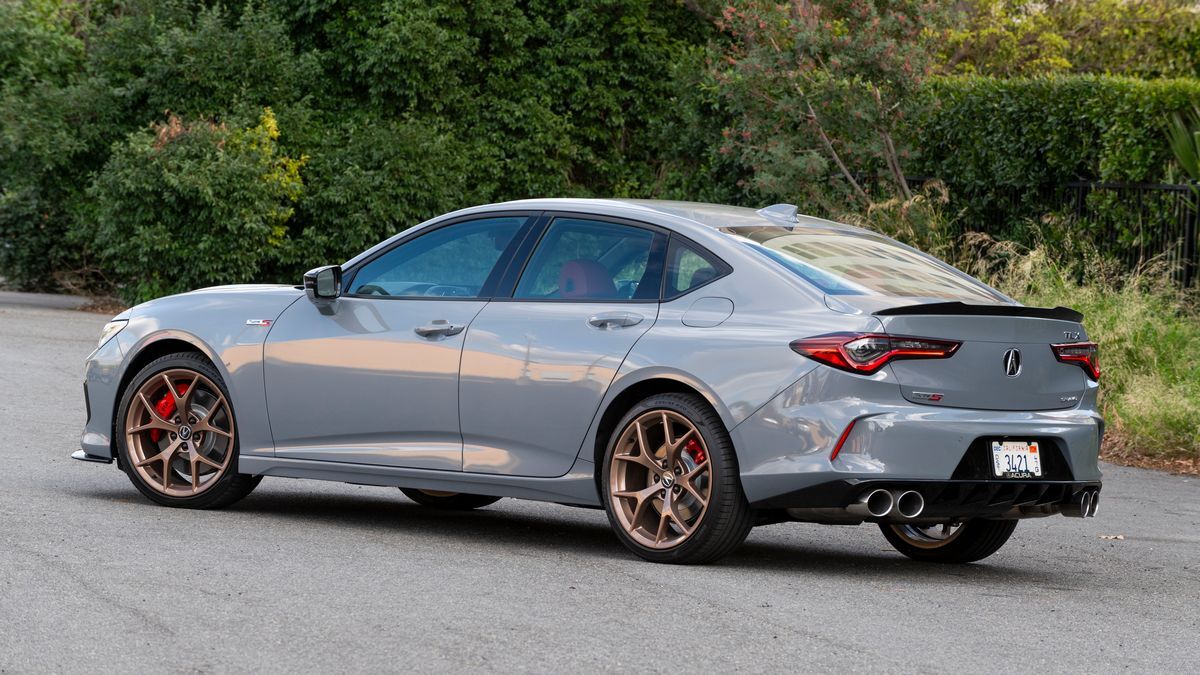 2025 Acura TLX Type S parked on a road near greenery.