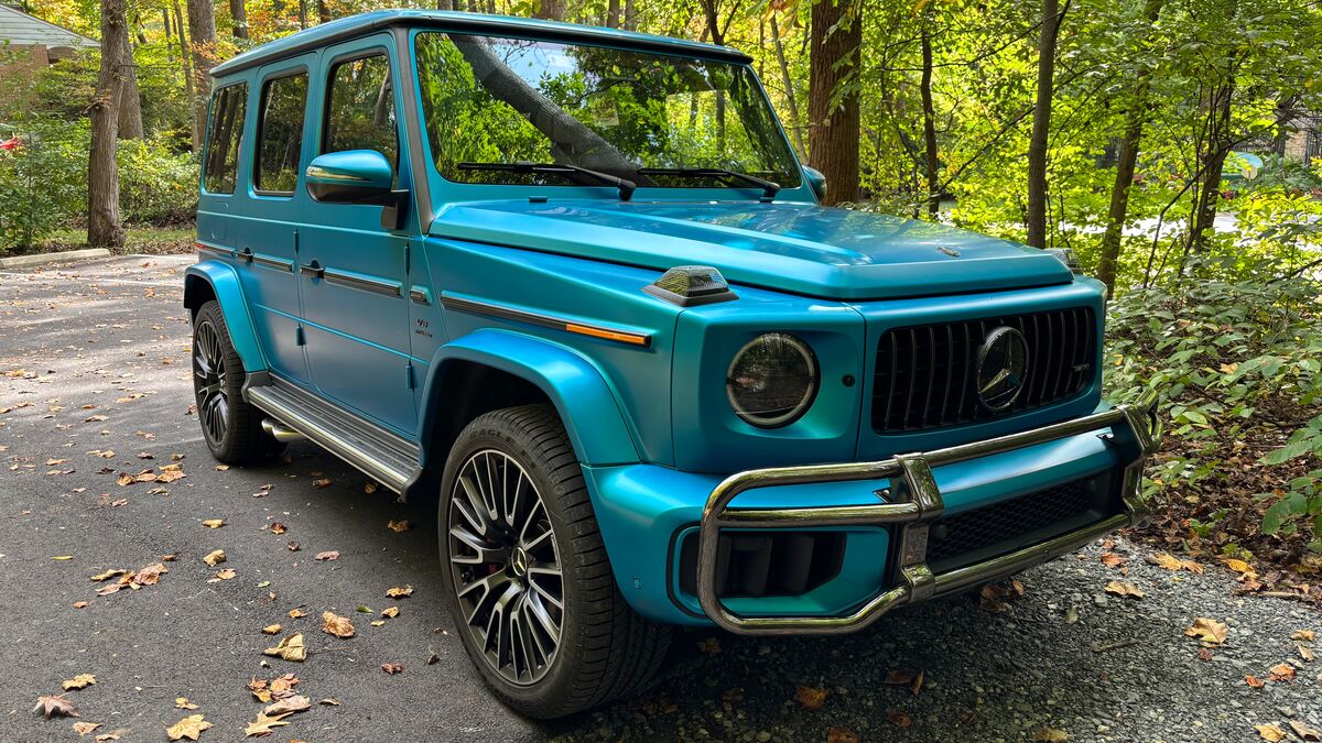 The 2025 Mercedes-AMG G 63 in Hyper Blue Magno seen from a front quarter angle