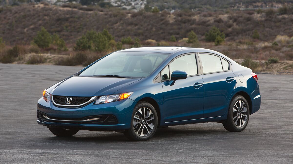  2014 Honda Civic parked outside on concrete.