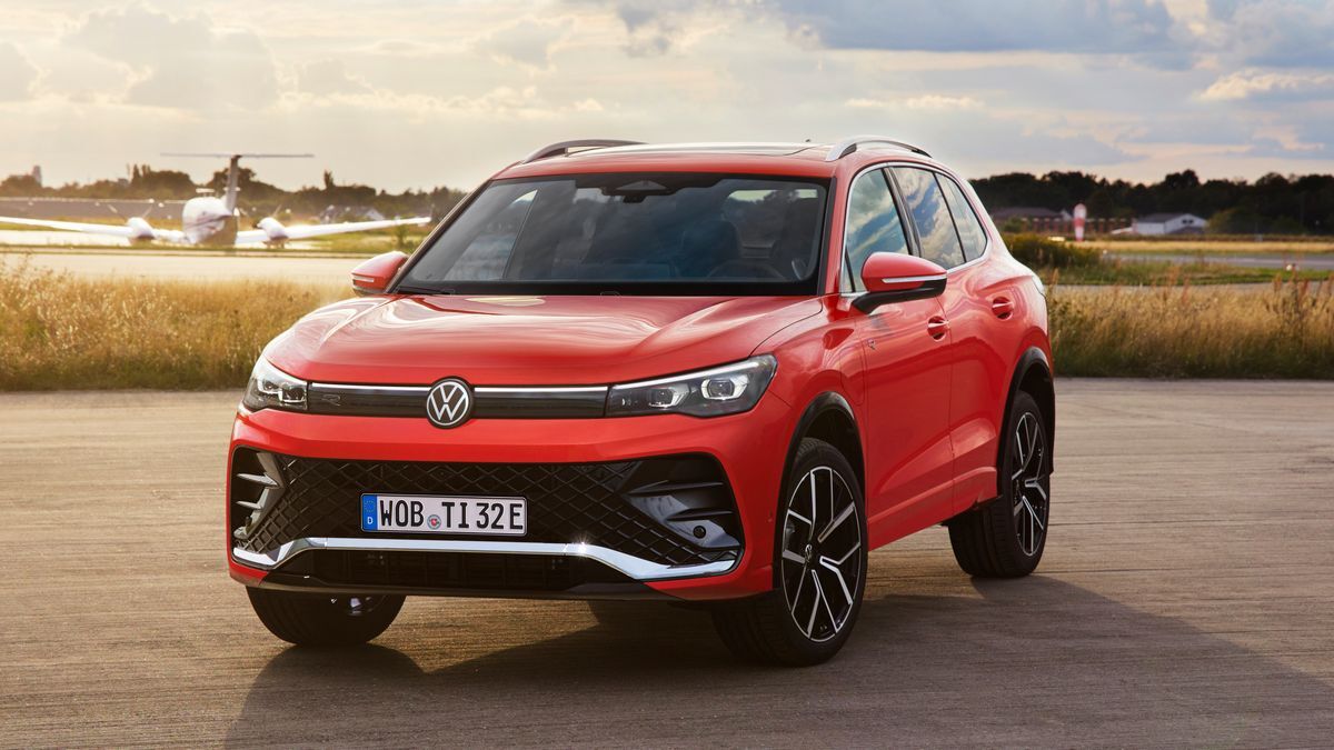 2025 Volkswagen Tiguan in red on a tarmac.