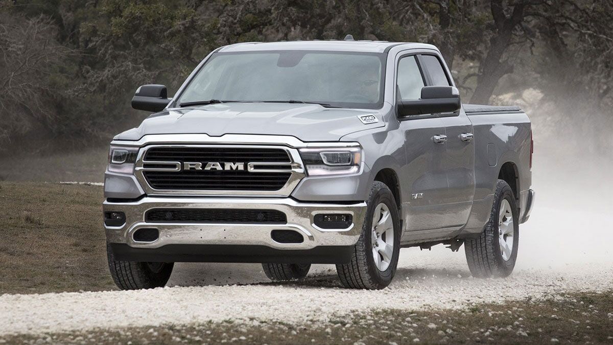 The 2021 Ram 1500 Bighorn in gray seen from a front quarter angle