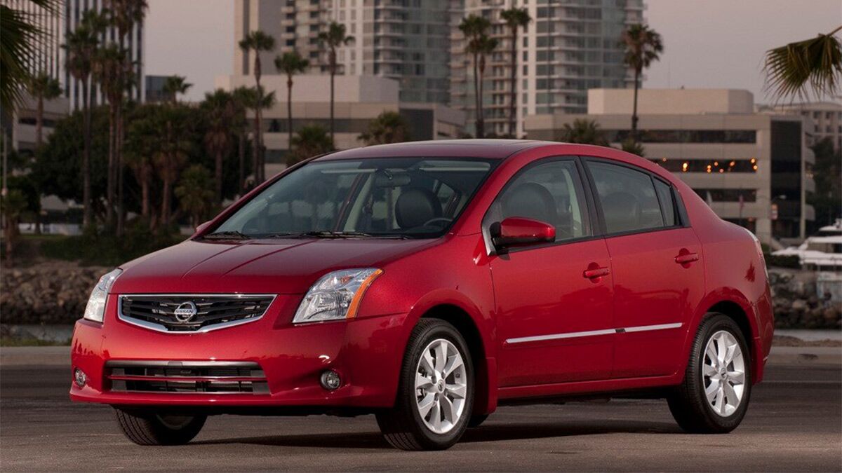 2012 Nissan Sentra parked outside.