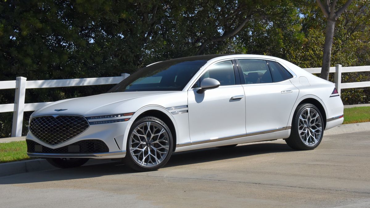 The Genesis G90 in white seen from a front quarter angle