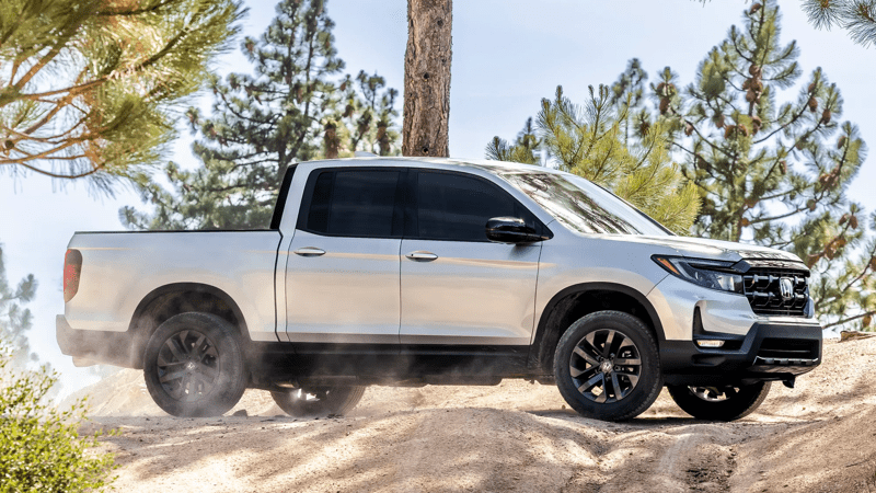 Silver 2026 Honda Ridgeline RTL in the forest.