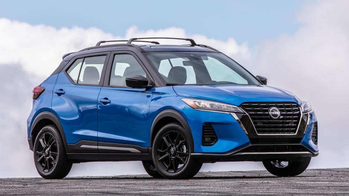 2024 Nissan Kicks in blue with clouds in the background.