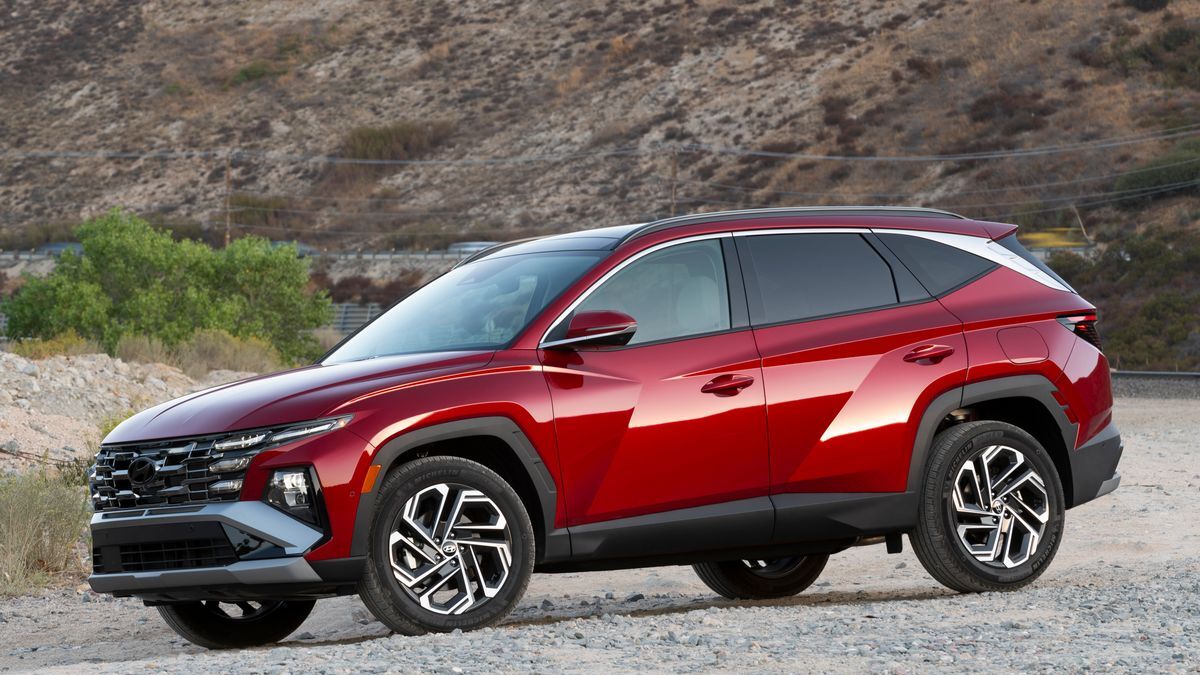 The 2025 Hyundai Tucson in red seen from a front quarter angle