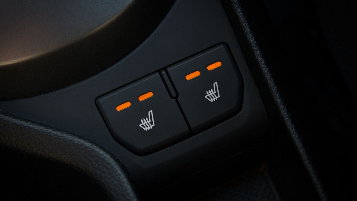 Two buttons to activate heated seats in a car