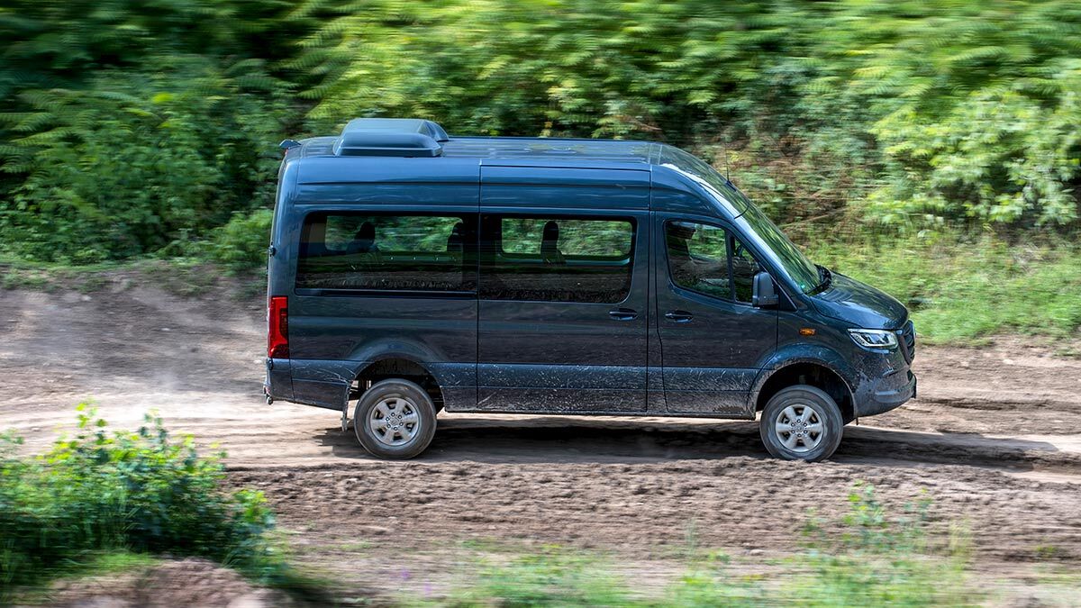 The 2024 Mercedes-Benz Sprinter in blue seen from a front quarter angle