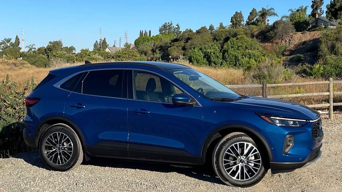 The 2022 Ford Escape PHEV in blue seen in profile