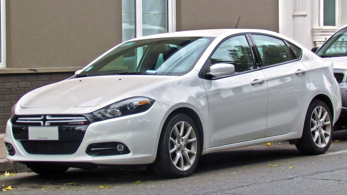 The 2014 Dodge Dart in white seen from a front quarter angle